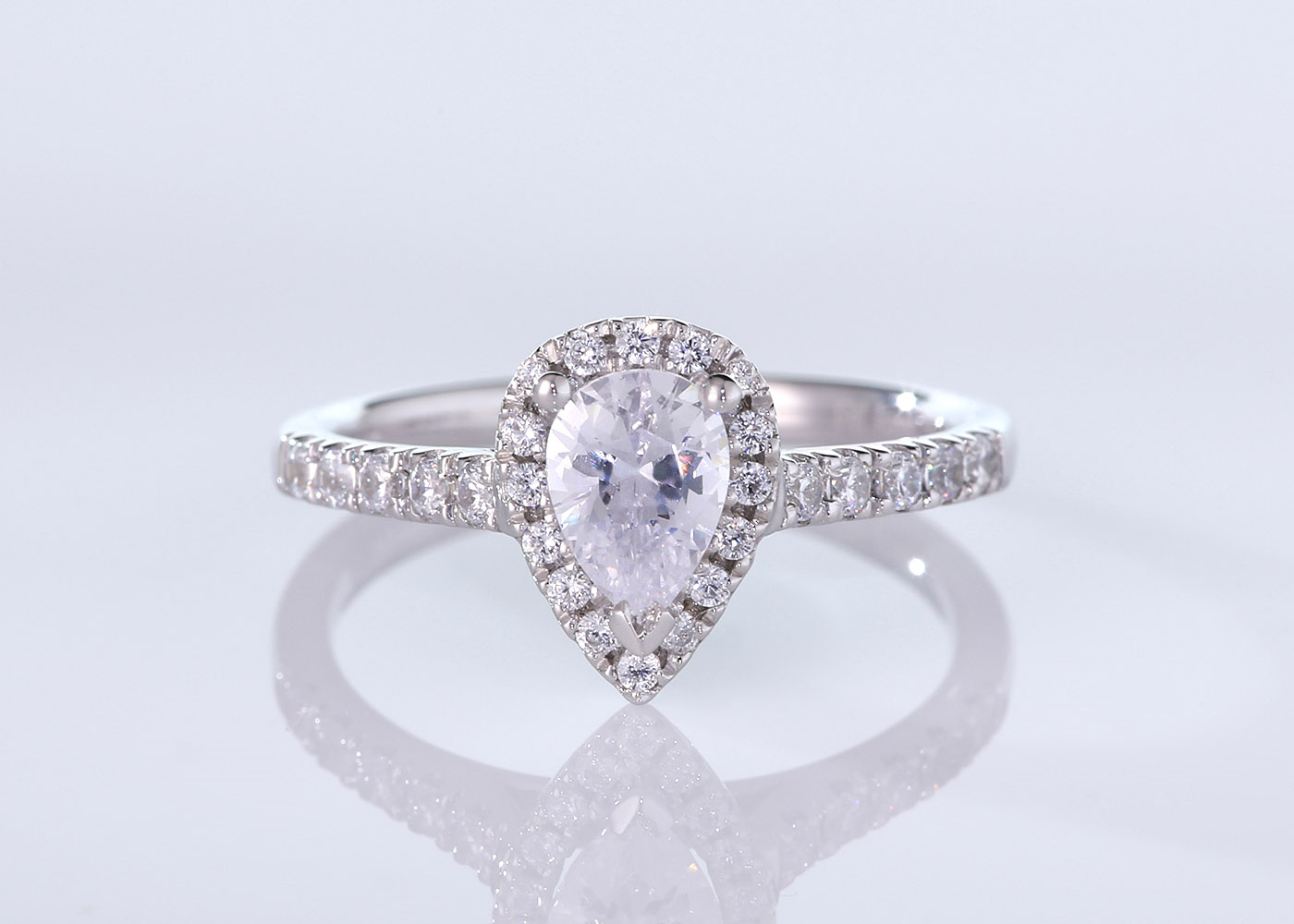Half Carat Pear Halo Diamond Ring in Platinum 950 360 image