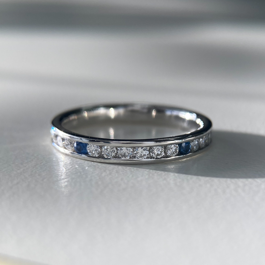 Platinum 2.7mm Full Channel Set Blue Sapphire and Diamond Ring
