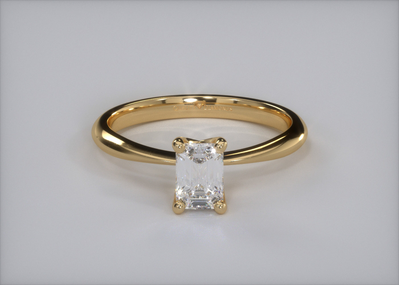 Half Carat Emerald Solitaire Diamond Engagement Ring in 18K Yellow Gold 360 image